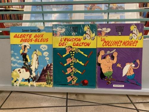 Lucky Luke E.O -Alerte aux Pieds-Bleus L'évasion des Dalton -Les collines noires